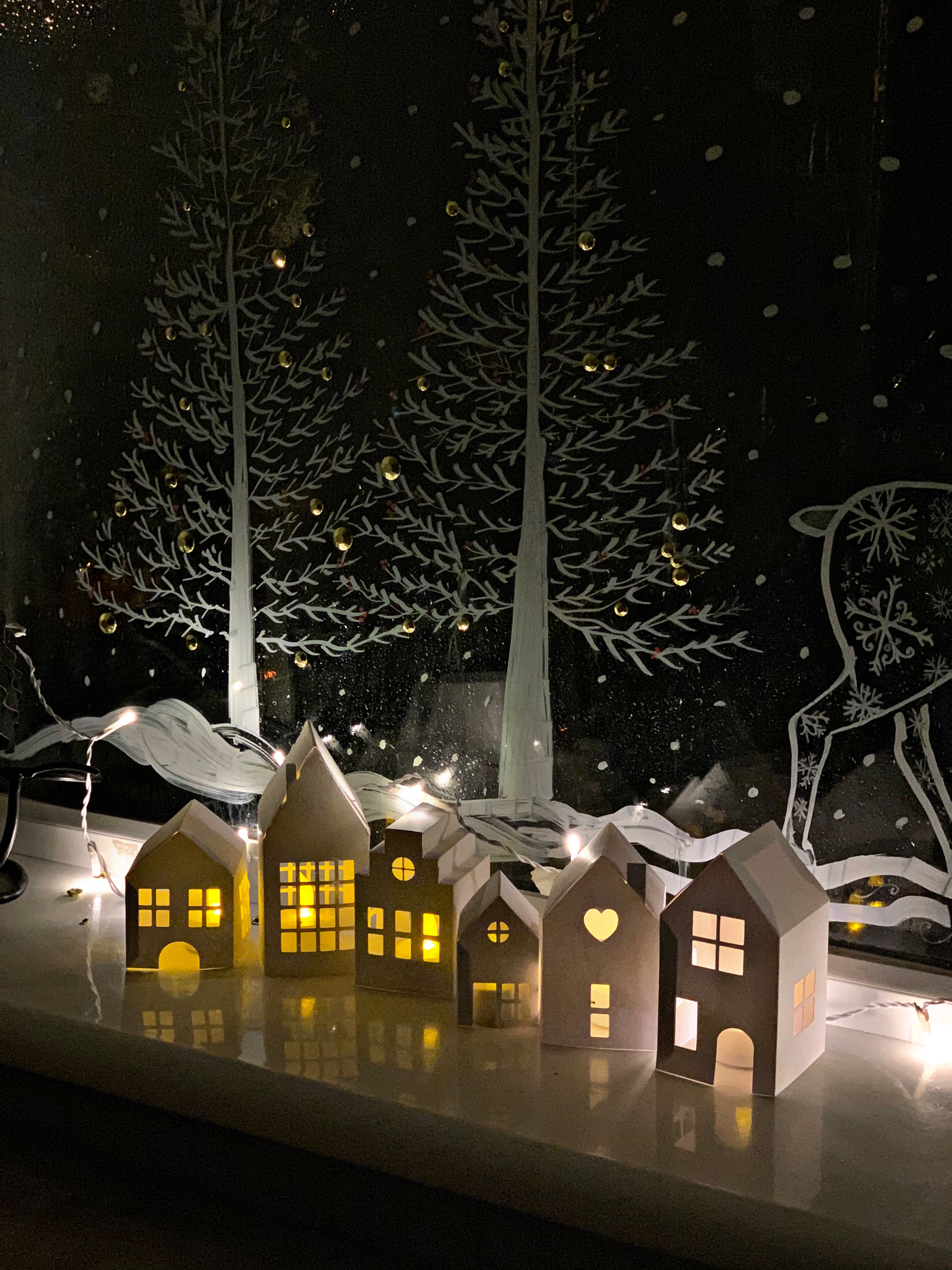 Making a paper craft Winter wonderland house