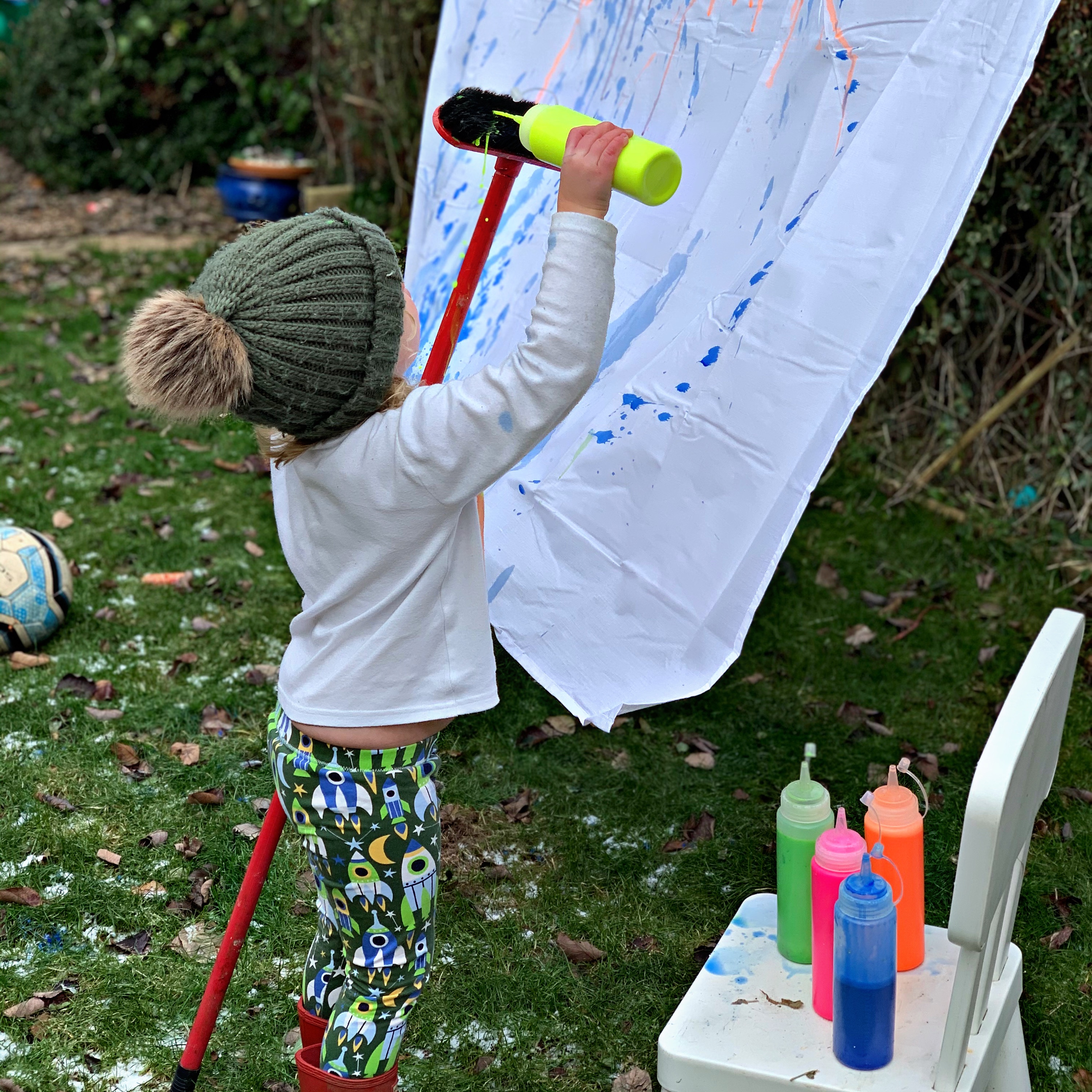 Painting outdoors with toddlers