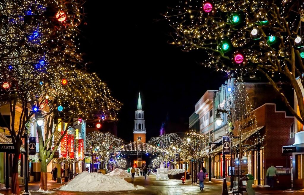 A city street save money when Christmas shopping.
