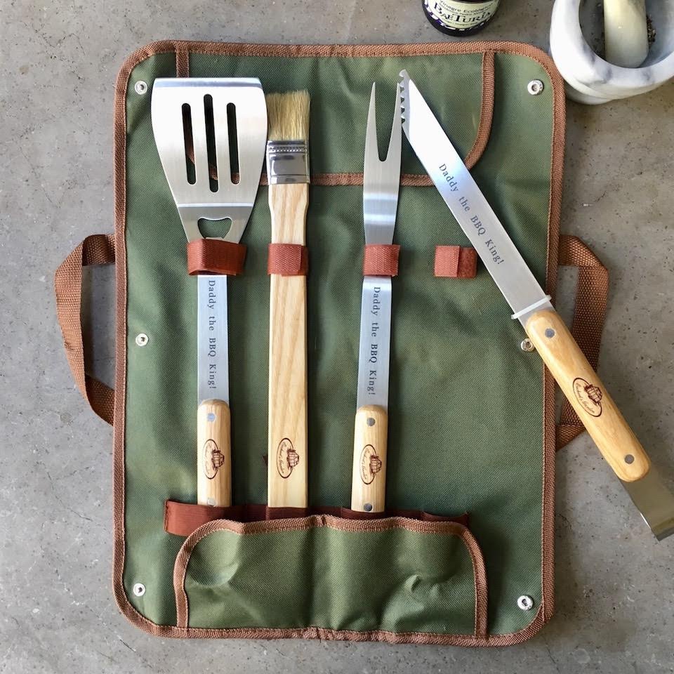 a set of kitchen utensils in a bag.