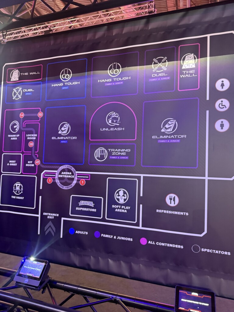 A colourful arena map shows event zones and clearly marks areas for spectators, snacks, and entrances.